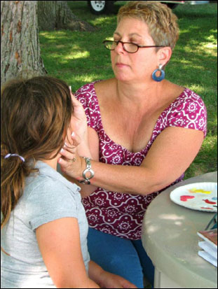 JoAnne Schlicher face painting for Dairy Days � 2011 Kurt Schlicher